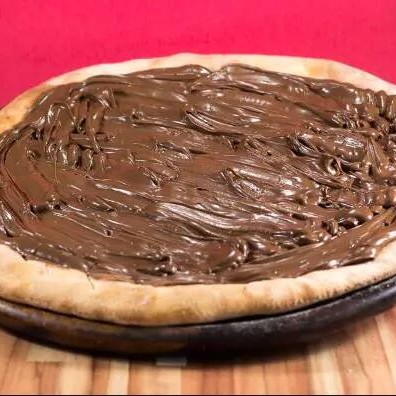 Essa é para os chocolovers. Massa fina coberto com delicioso chocolate ao leite derretido. É de dar água na boca.