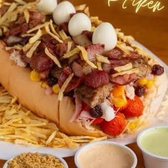 "Cachorro Quente - Pequeno Simples 20cm 2 salsinhas, molho '' cebola e tomate "" batata palha, ketchup, maionese, mostarda e maionese temperada da casa."