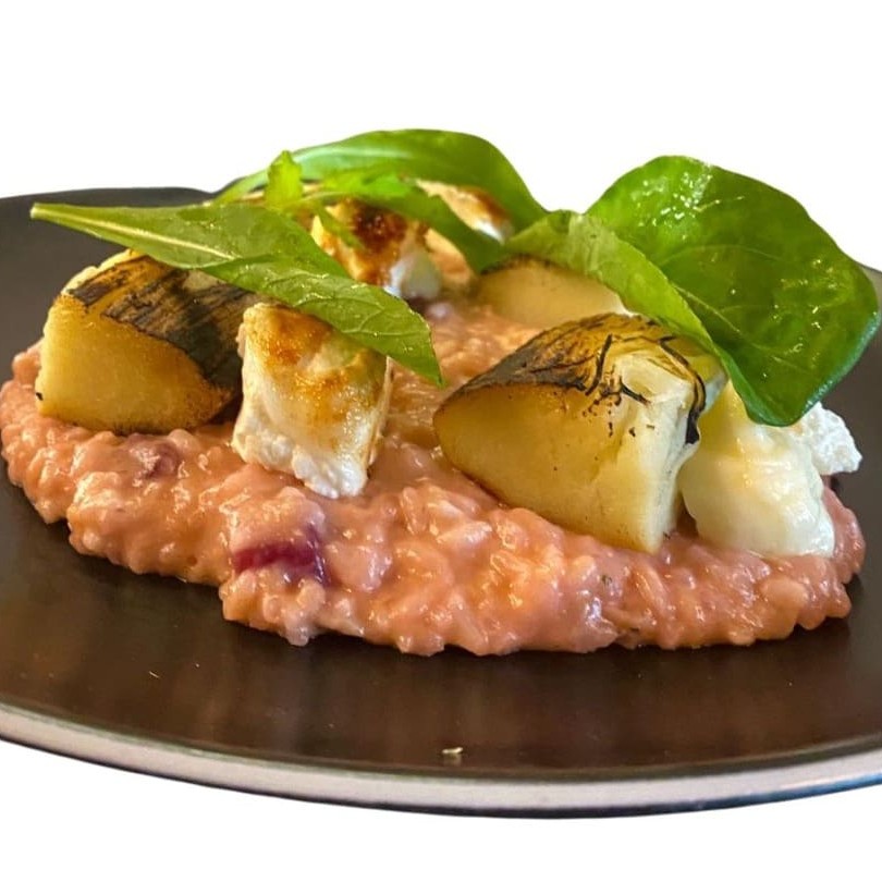 Risoto de beterraba com queijo de cabra, palmito e rucula fresca