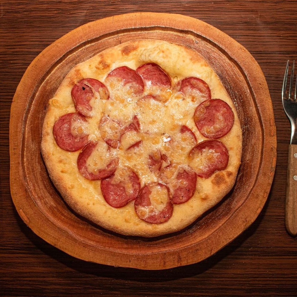 Esfiha de calabresa + Guaravita.