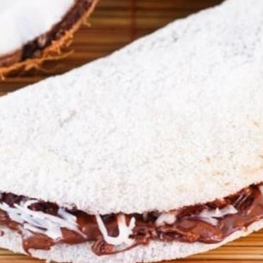 Deliciosa Tapioca com recheio de Coco Com Chocolate. Foto ilustrativa.