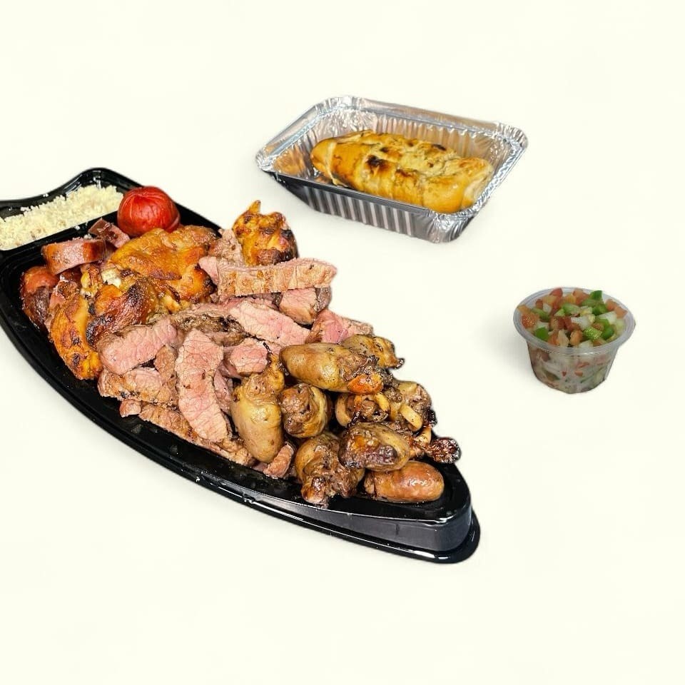Uma seleção de carnes nobres grelhadas na brasa, incluindo carne, coração, linguiça, drumet e salsichão. Servidas com uma porção de farofa caseira, uma porção de molho a campanha e um pão de alho. O verdadeiro sabor do churrasco!