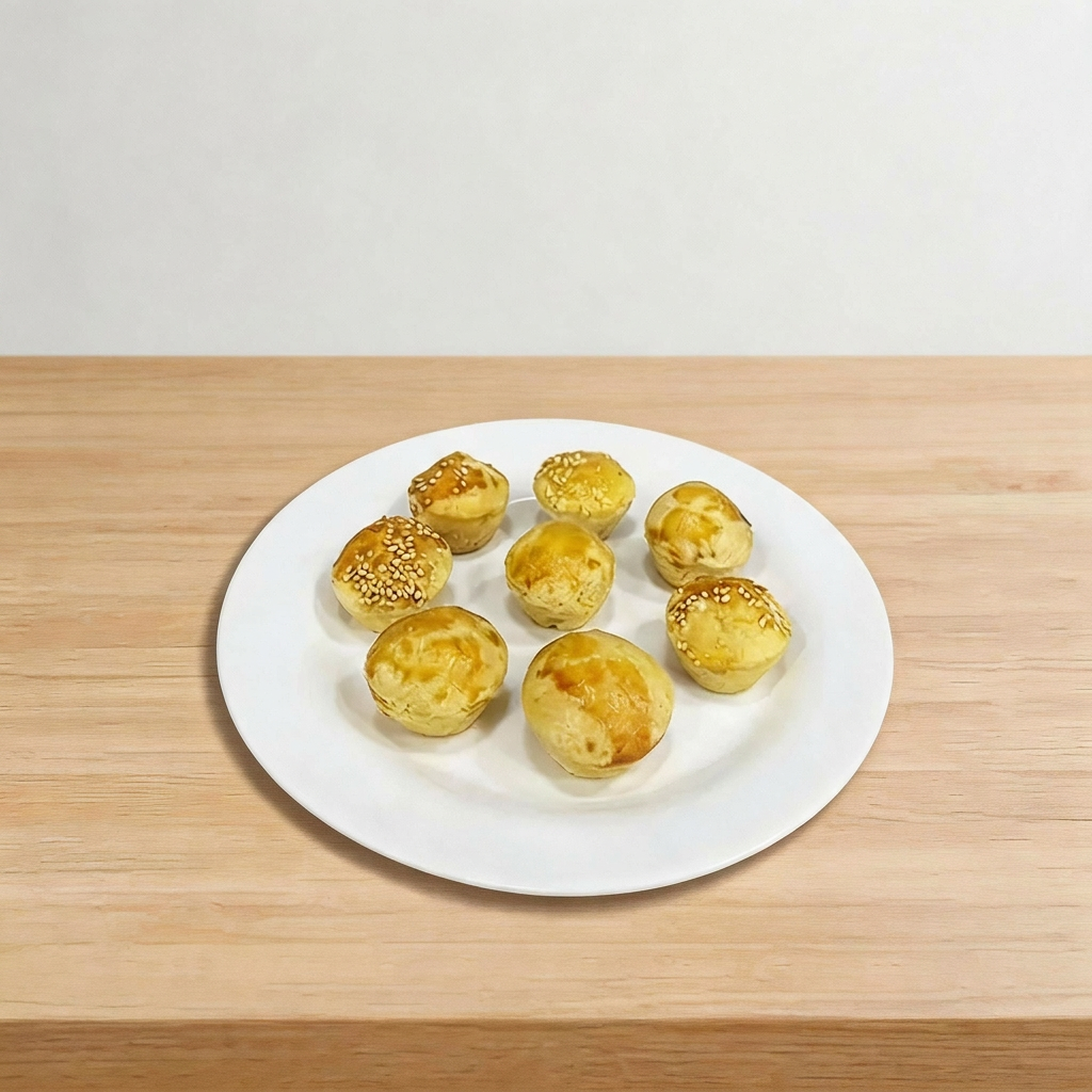 Encante-se com nossas empadas cremosas de palmito uma combinação perfeita de sabor e delicadeza! Com massa amanteigada que desmancha na boca, são recheadas com palmito picado, azeitonas e legumes selecionados, tudo no ponto certo de cremosidade. Uma delícia irresistível que você precisa experimentar!