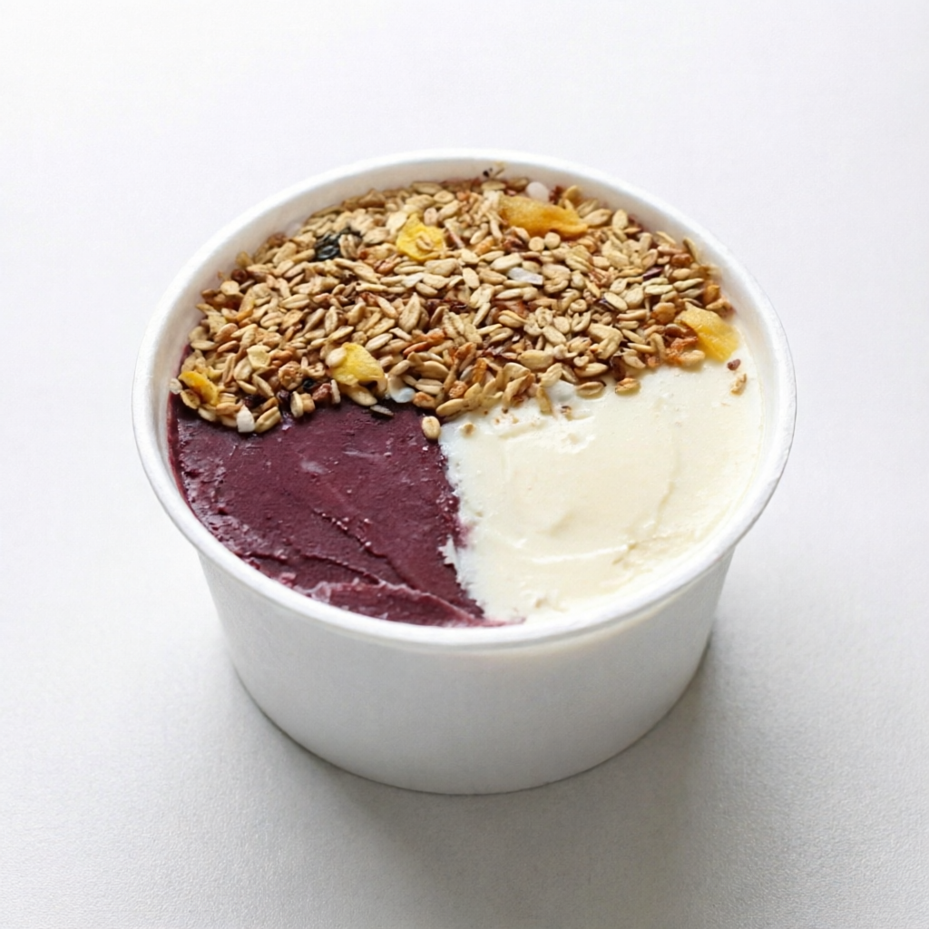 Metade açaí, metade cupuaçu, 100% sabor! Cremoso, refrescante e preparado na hora. Monte do seu jeito com nossos acompanhamentos."