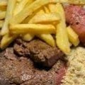 Acompanha: Churrasco Misto, Baião, Farofa, Vinagrete e Batata frita