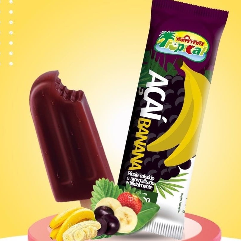 Descubra o encanto do nosso Picolé de Açaí, um deleite congelado que promete refrescar e deliciar o seu paladar. Este picolé não é apenas um picolé comum, é uma experiência sensorial tropical. Entrelaçado com o sabor exótico e vibrante do açaí, temos também os sabores adicionais de morango e banana. O morango acrescenta um toque de doçura e acidez, enquanto a banana complementa com uma textura cremosa e um sabor suave. A combinação é simplesmente irresistível, criando uma explosão de sabor em cada mordida. Experimente e deixe-se encantar!