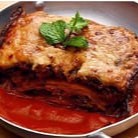 Lasanha de berinjela com lâminas de, batata, compota de tomate, manjericão. Acompanha salada ou taboule