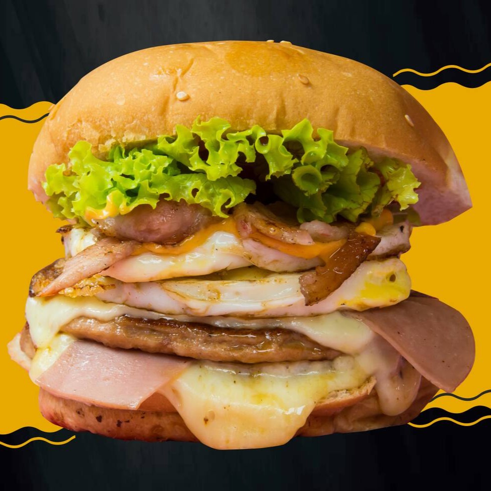 Pão com gergelin, 2 carnes 2 ovos, queijo, presunto, bacon, molho billy jack sabor cheddar, katchup, alface