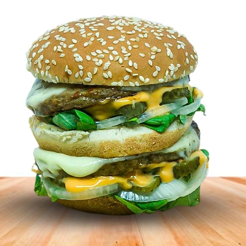 "Apresentamos o Mec Mec esse ""inesquecível"" hambúrguer que caiu na graça do povo, fazendo sucesso pelo mundo é composto por: (2 hambúrgueres, alface, queijo, molho especial, cebola, picles no pão com gergelim) Um produto de excelente qualidade que prometemos entregar quentinho direto na sua residência, para uma experiência gastronômica inesquecível!"