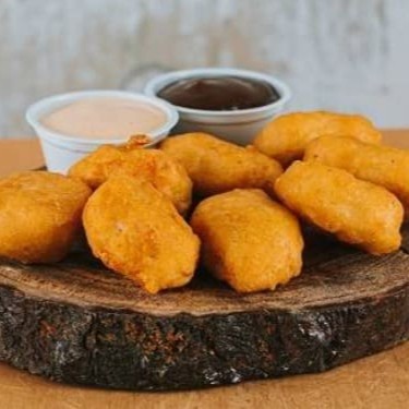 Deliciosos nuggets de frango em porções de três tamanhos para você aproveitar!