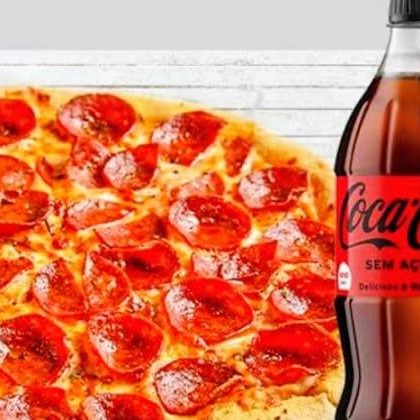 PIZZA DE 25CM + REFRI LATA