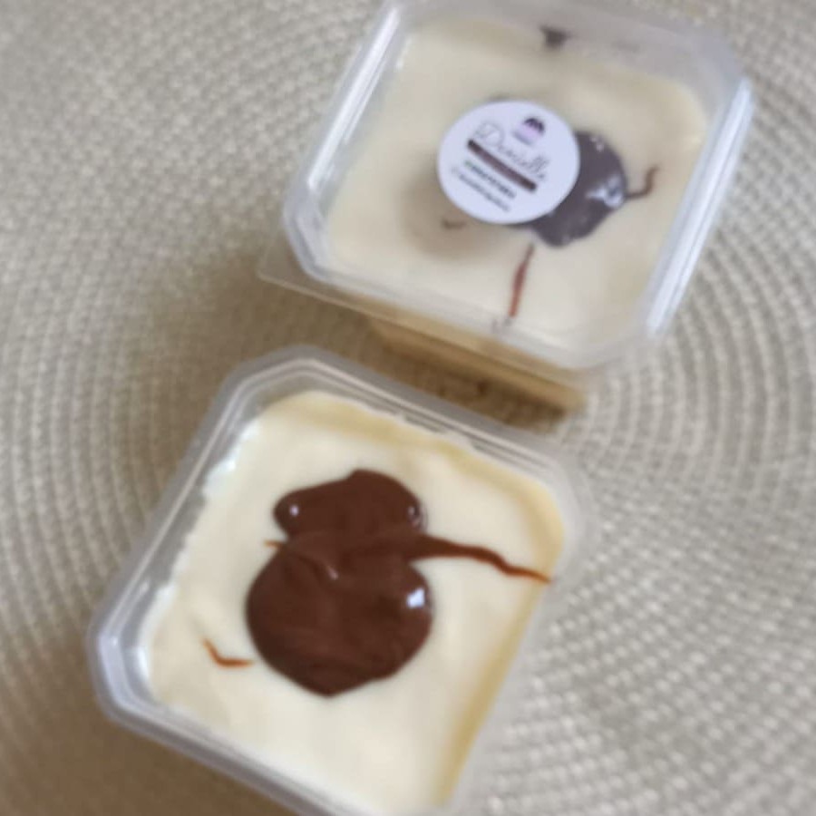 Delicioso bolo de massa branca molhadinho e sem miséria de recheio de Ninho e Nutella