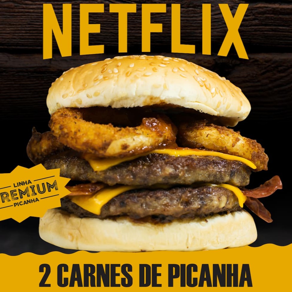 Pão com gergelim, 2 carnes picanha 120g, queijo cheddar, calabresa fateada, barbecue, 2 aneis de cebola