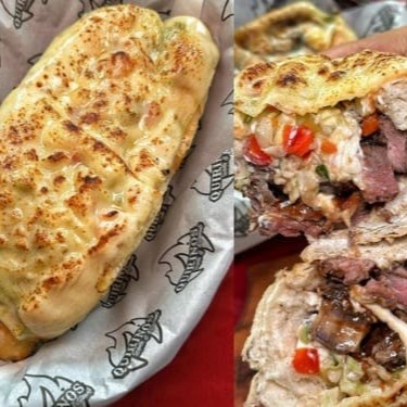 Baguete de 15 a 20cm coberta com queijo parmesâo, 180g de contra filé, Queijo derretido, Pasta de alho Vinagrete, Maionese especial.