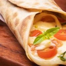 Massa crocante, molho de tomate, mussarela, parmesão, tomate, manjericao e oregano.