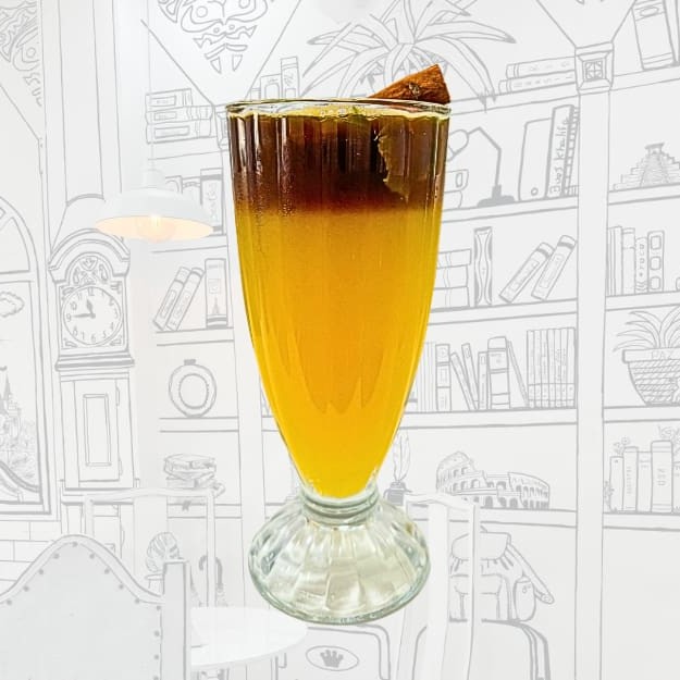 Refrescante suco de laranja natural, hortelã, finalizado um espresso especial e canela.
