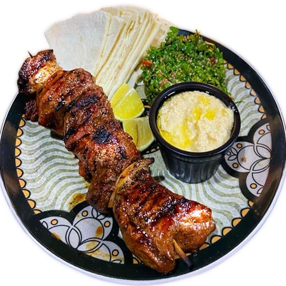 O Michuí Ii é a sua experiência completa com o nosso michuí, na versão premium que você merece. Churrasco de alcatra, cebola, tomate e pimentão amarelo. Vem com homus, tabule, pão árabe.