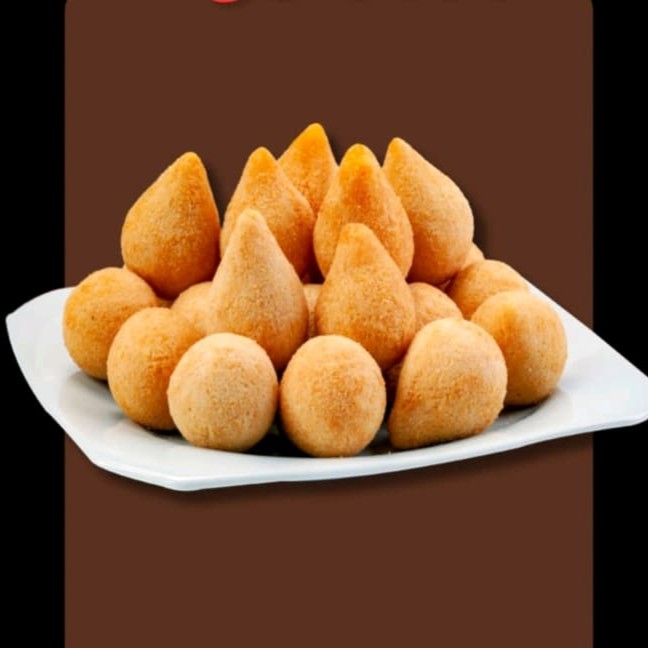 Sao 20 salgadinhos fritos na hora acompanhado de um copo de Guaraná natural bem gelado