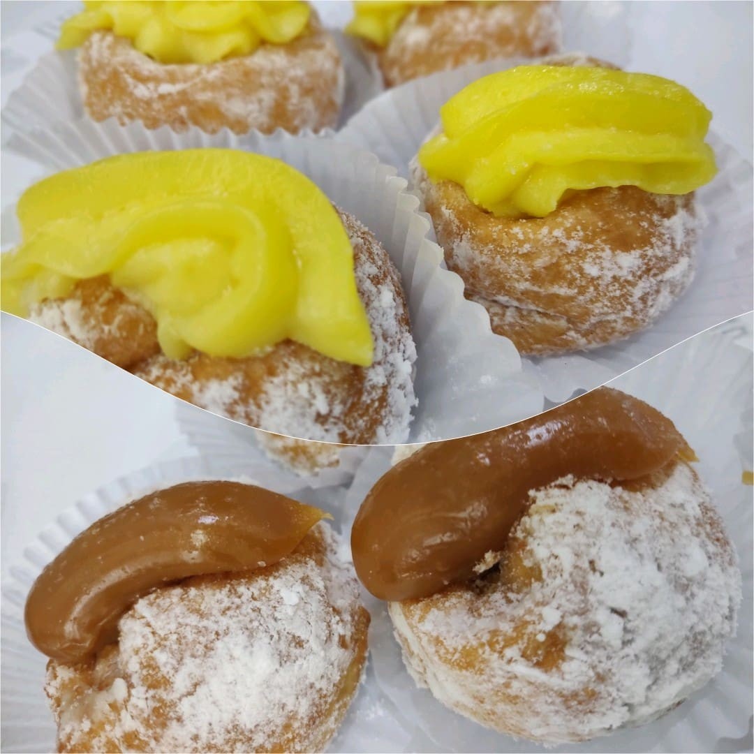 Uma unidade de sonho feito com uma massa leve e recheio saboroso de doce de leite ou creme.