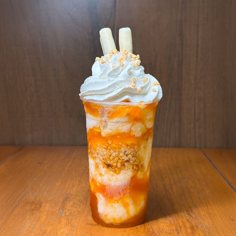 Açaí com recheio de creme de Tangerina com Pimenta. A união refrescante da tangerina com o toque picante da pimenta em uma explosão de sabor única!