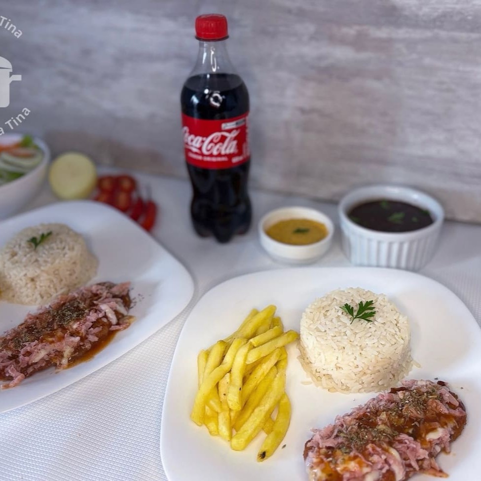 Esse combo acompanha 2 quentinhas de Contra Filét a Parmegiana  + 1 Coca-Cola 600ml, ideal para 2 pessoas!