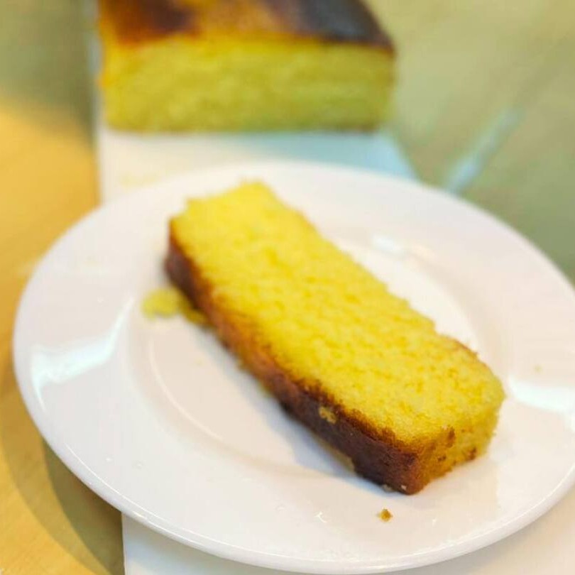 Delicioso corte do nosso especial  bolo de Laranja.