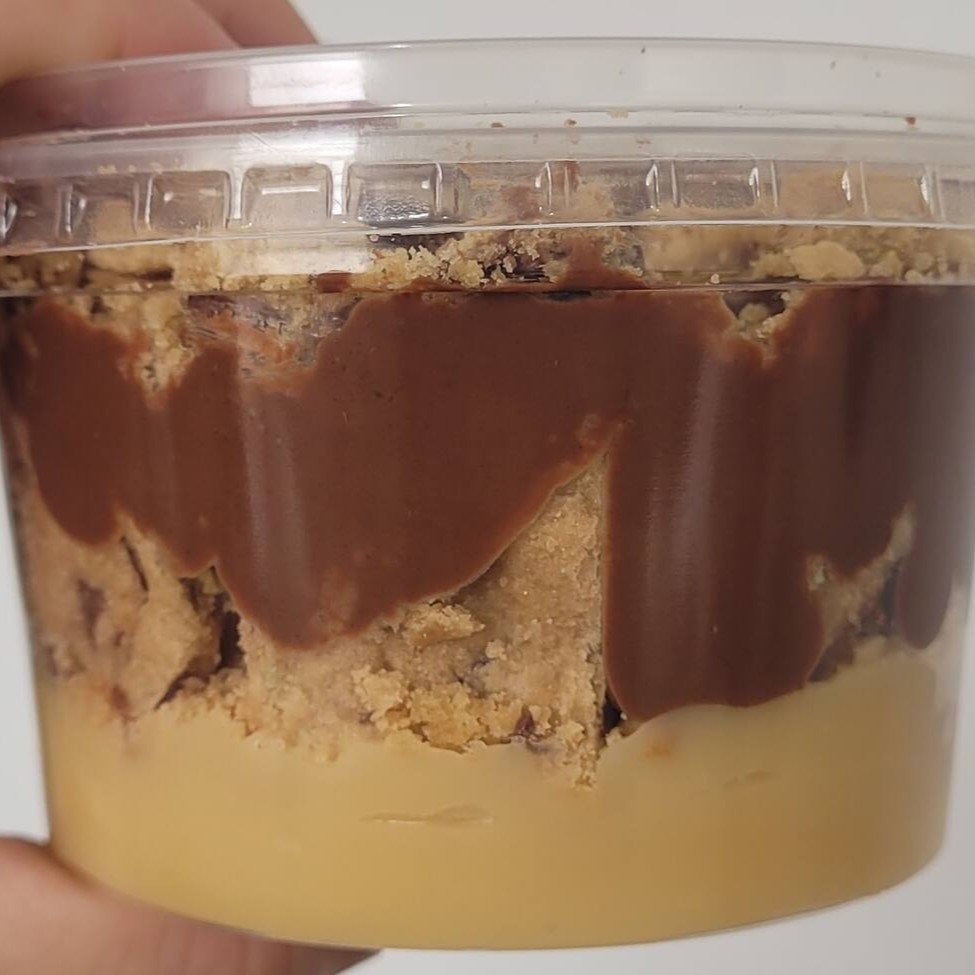 Aquele pote para se deliciar  Nosso brigadeiro cremoso de leite Ninho, muitos pedaços do nosso cookie de baunilha chocolatudo e mtaaa Nutella   Aproximadamente 250g