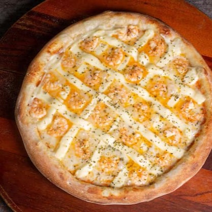 Experimente a explosão de sabor que você merece com a nossa Pizza Brotão Deliciosa (25cm)! Escolha sua combinação premium favorita, feita com ingredientes frescos e selecionados. É a opção perfeita para matar a fome com muito sabor, qualidade e praticidade, ideal para um lanche rápido.