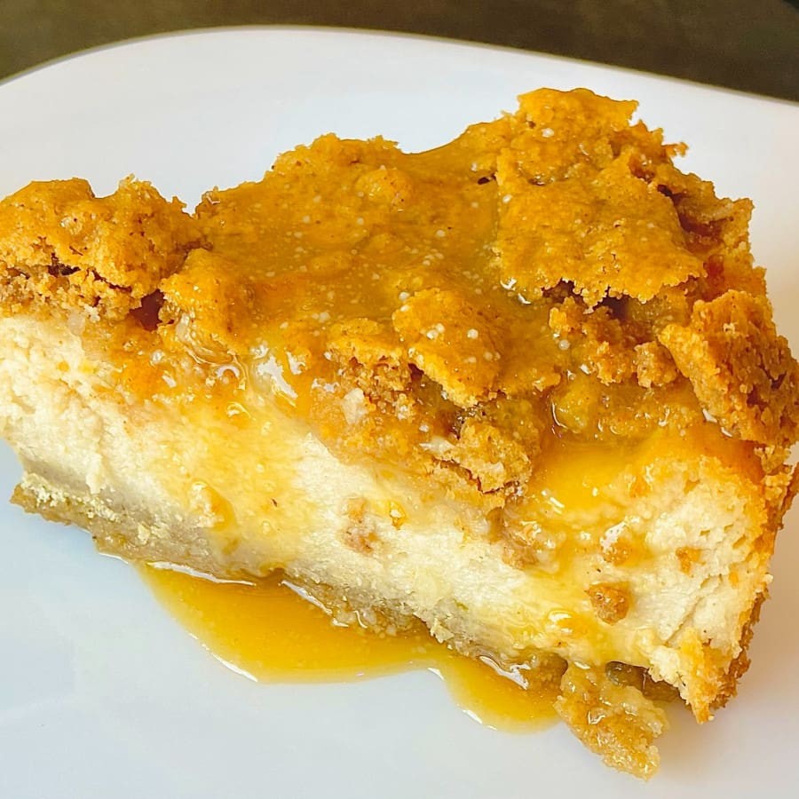 (fatia) (170g) - Finalizada com calda de caramelo artesanal. *Contém açúcar, amêndoas, aveia, amendoim, grão de bico, soja e canela.