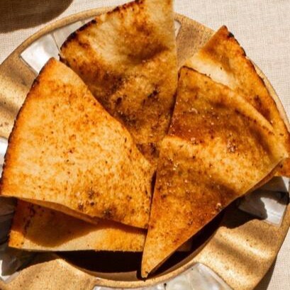 Torradinha de pão árabe no azeite com especiarias. Super crocante e saborosa. 90g