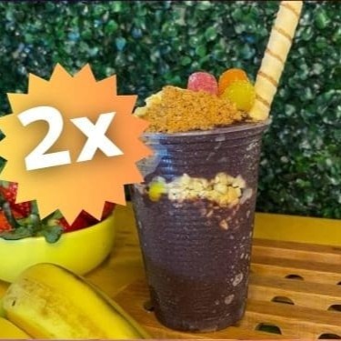 Saboreie o nosso '2x Açaí 400 ml', classificado como o 'Melhor Açaí da Região' na categoria 'Em Dobro, Tem Desconto'. Este prato traz duas porções generosas de açaí, servidas em copos de 400 ml, repletas de uma diversidade de toppings e frutas frescas que proporcionam uma explosão de sabores. As caldas, meticulosamente escolhidas, adicionam um toque final a esta obra-prima gastronômica, tornando-a absolutamente irresistível. É a combinação perfeita para quem deseja uma refeição refrescante, nutritiva, e extremamente deliciosa. Experimente esta maravilha e permita que o nosso açaí conquiste seu paladar!
