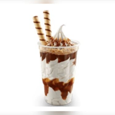 A medida certa entre calda é um delicioso sorvete de baunilha que pode fazer você viver uma experiência incrível. Desfrute dessa combinação perfeita!