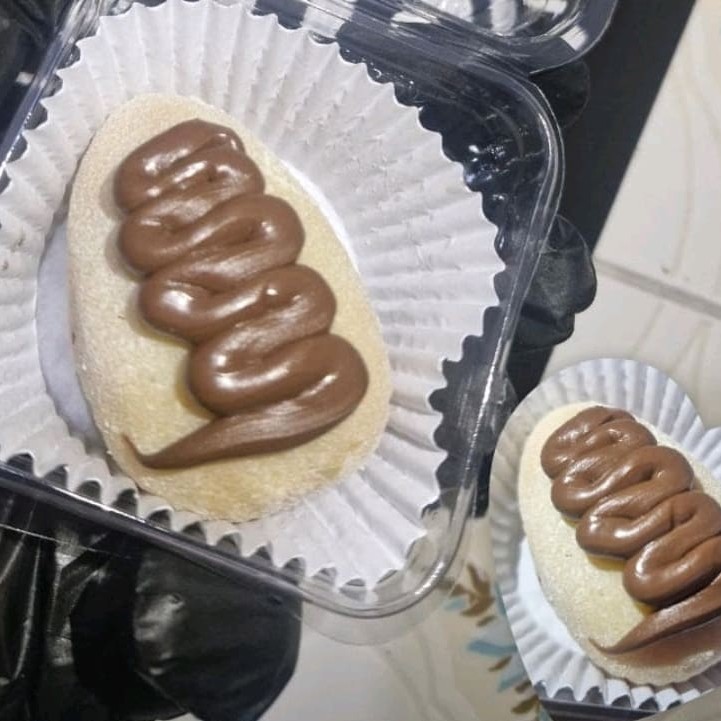 Uma deliciosa coxinha de Ninho com Nutella feito com morango fresco, brigadeiro de Ninho cremoso e uma deliciosa Nutella por cima.