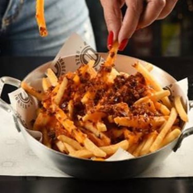 Batata com cheddar e bacon crocante