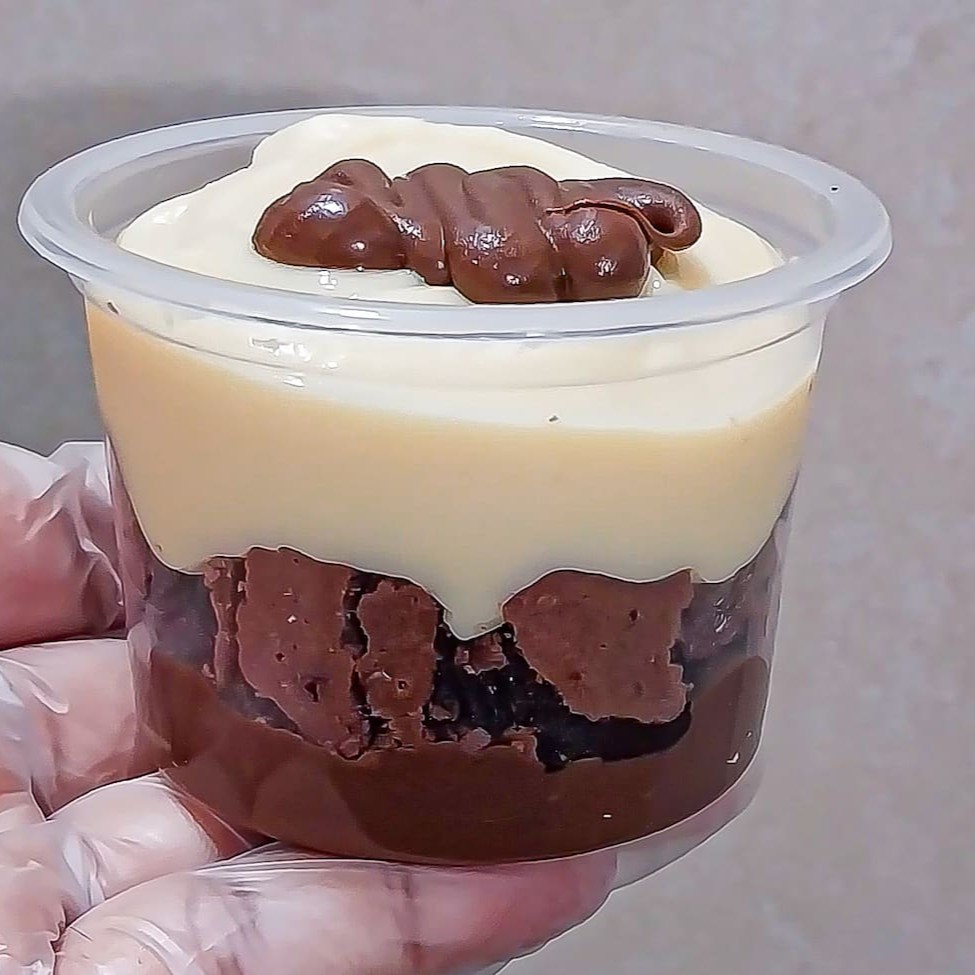 Pote de 145 ml recheado com nosso delicioso e leve creme de leite ninho , Nutella pura e um chocolatudo brownie
