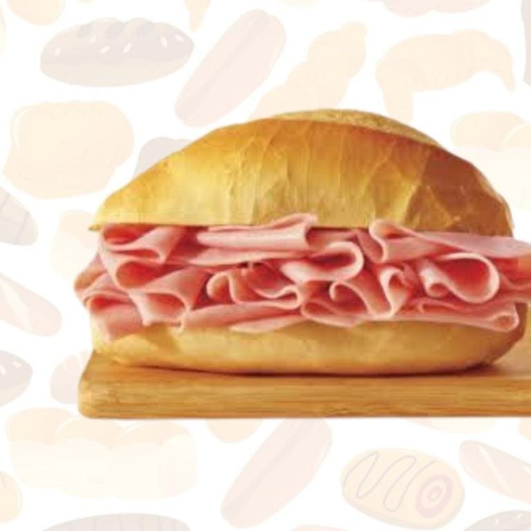 Pão com manteiga e presunto