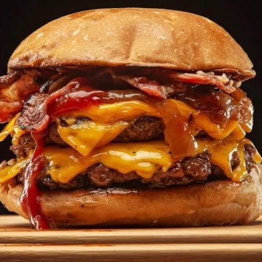 Pão, 2 carnes 70g, 2 queijo cheddar, calabresa e bacon.