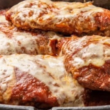 A milanesa com presunto molho de tomate e mussarela