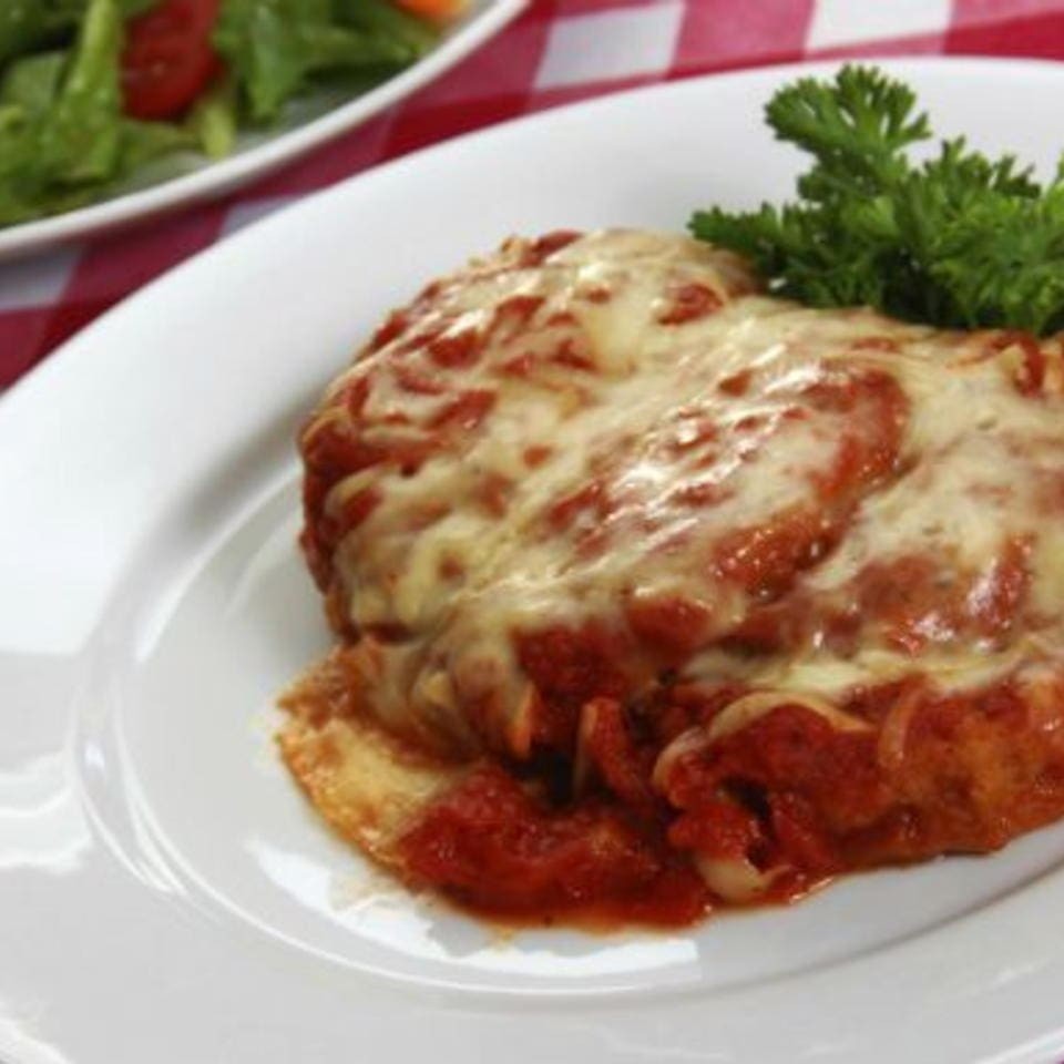 Executivo de Frango à Parmegiana. Nessa refeição o feijão vai separado das outras guarnições.