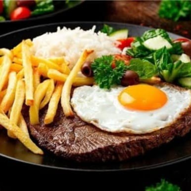 Delicie-se com o nosso suculento  bife bovino a cavalo ,acompanhado por um delicioso arroz, feijão cremoso e macarrão al dente. Para dar aquele toque especial, acrescentamos uma crocante farofa e um toque de frescor com alface e tomate. Nossa combinação única de sabores e texturas é garantia de uma refeição completa e saborosa que vai conquistar o seu paladar. Experimente agora!Delicie-se com o nosso suculento filé de frango empanado acompanhado por um delicioso arroz, feijão cremoso e macarrão al dente. Para dar aquele toque especial, acrescentamos uma crocante farofa e um