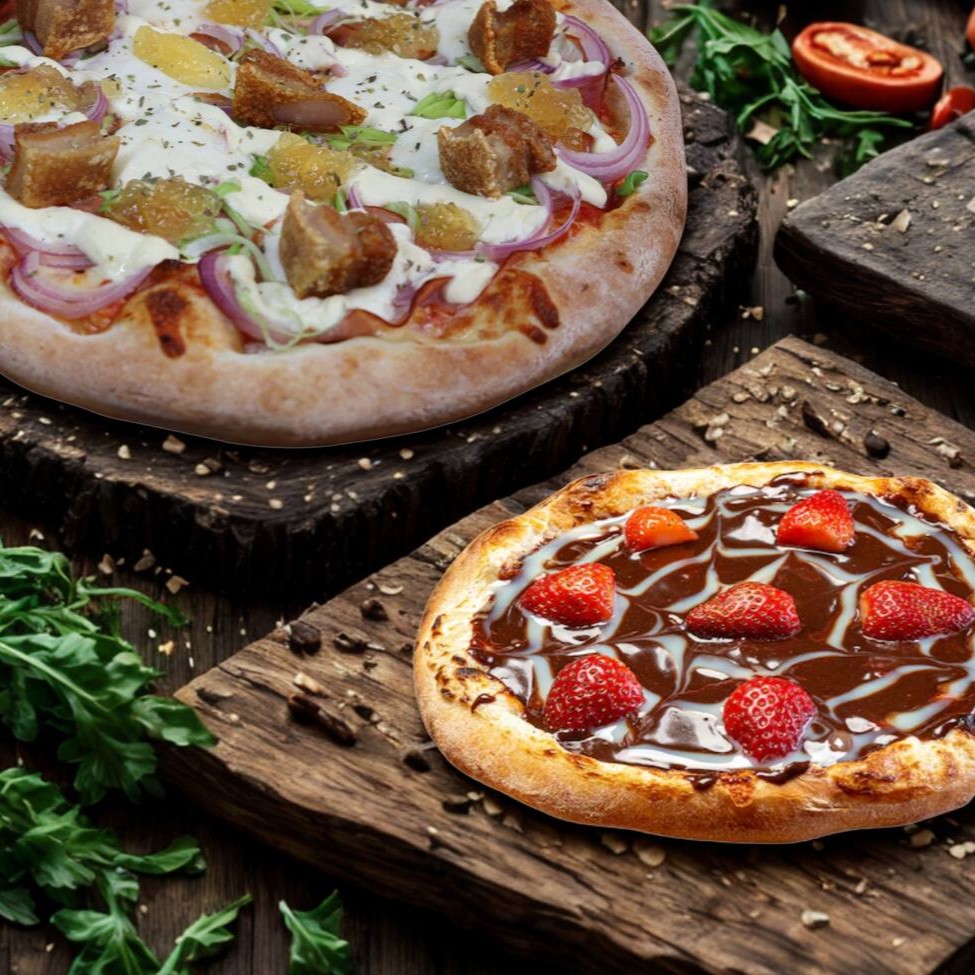 Pizza Gigante 35 cm 8 fatias + pizza doce (brotinho) 20 cm. Massa artesanal livre de ovos e lactose de longa fermentação (à partir de 48 horas) para melhor sabor, leveza e digestibilidade.