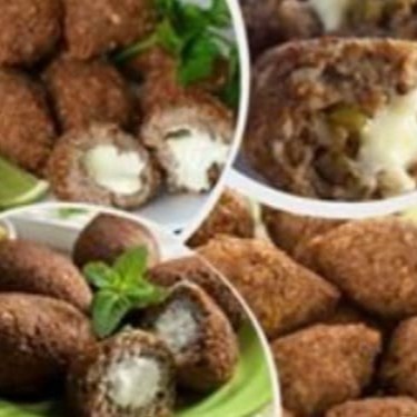 São 20 Kibe Recheado com Queijo e Alho, crocantes por fora, suculentos por dentro, uma verdadeira uma comida tipo árabe.