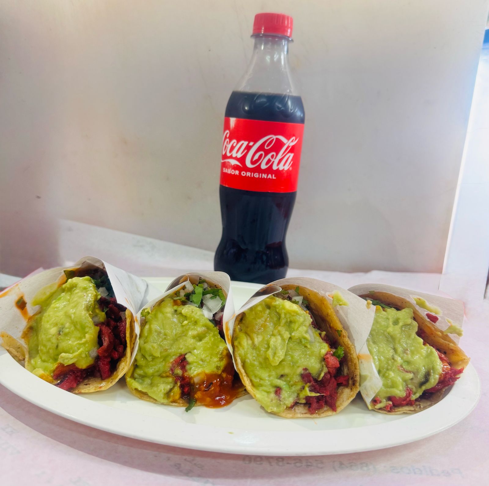 4 Tacos de Adobada mas Coca