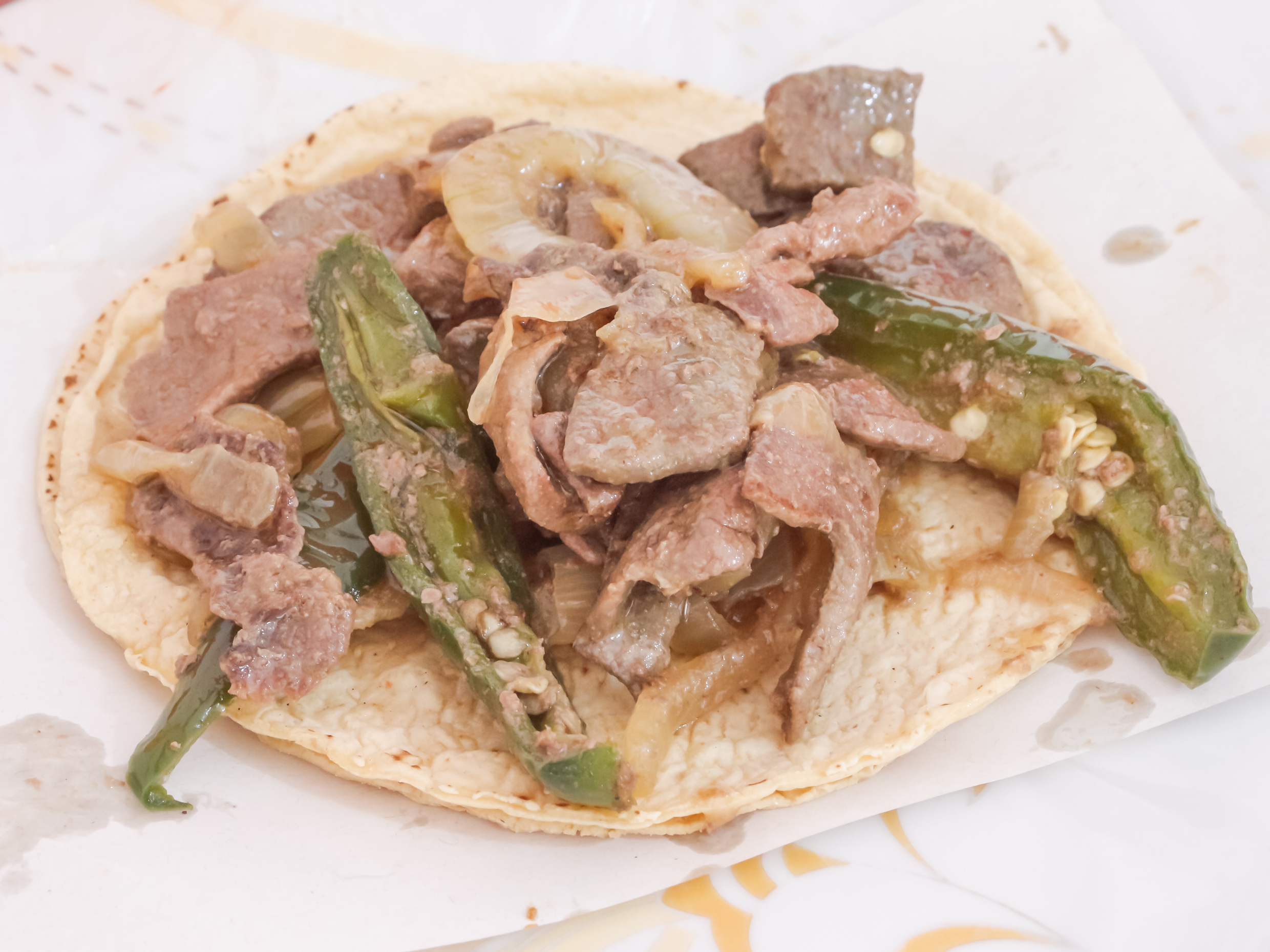 Taco de Hígado Encebollado