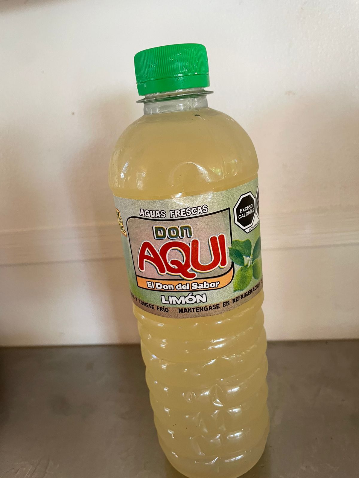 Agua de 1/2 litro sabor limon