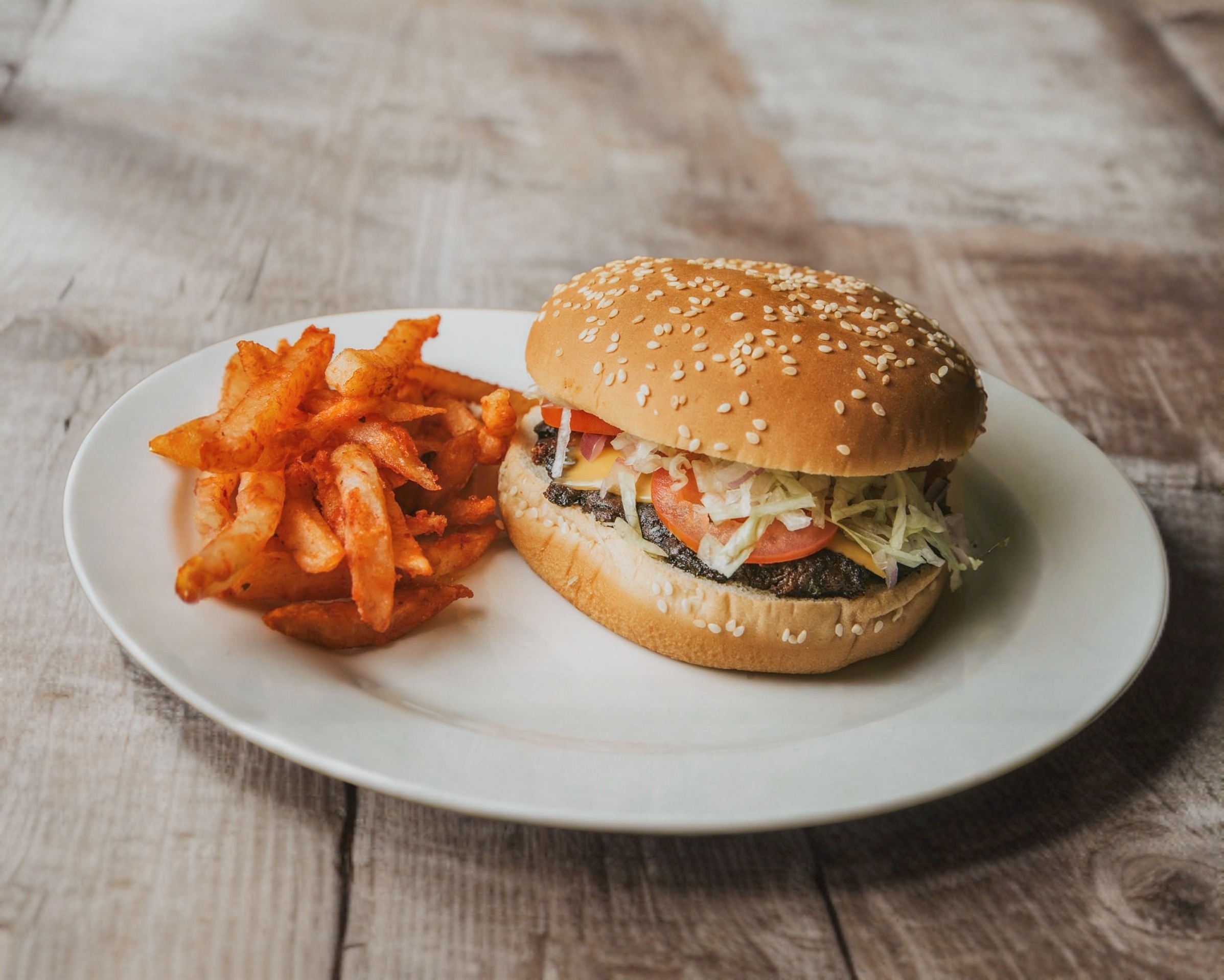 Hamburguesa Clasica + 6 Boneless + Papas o Aros.