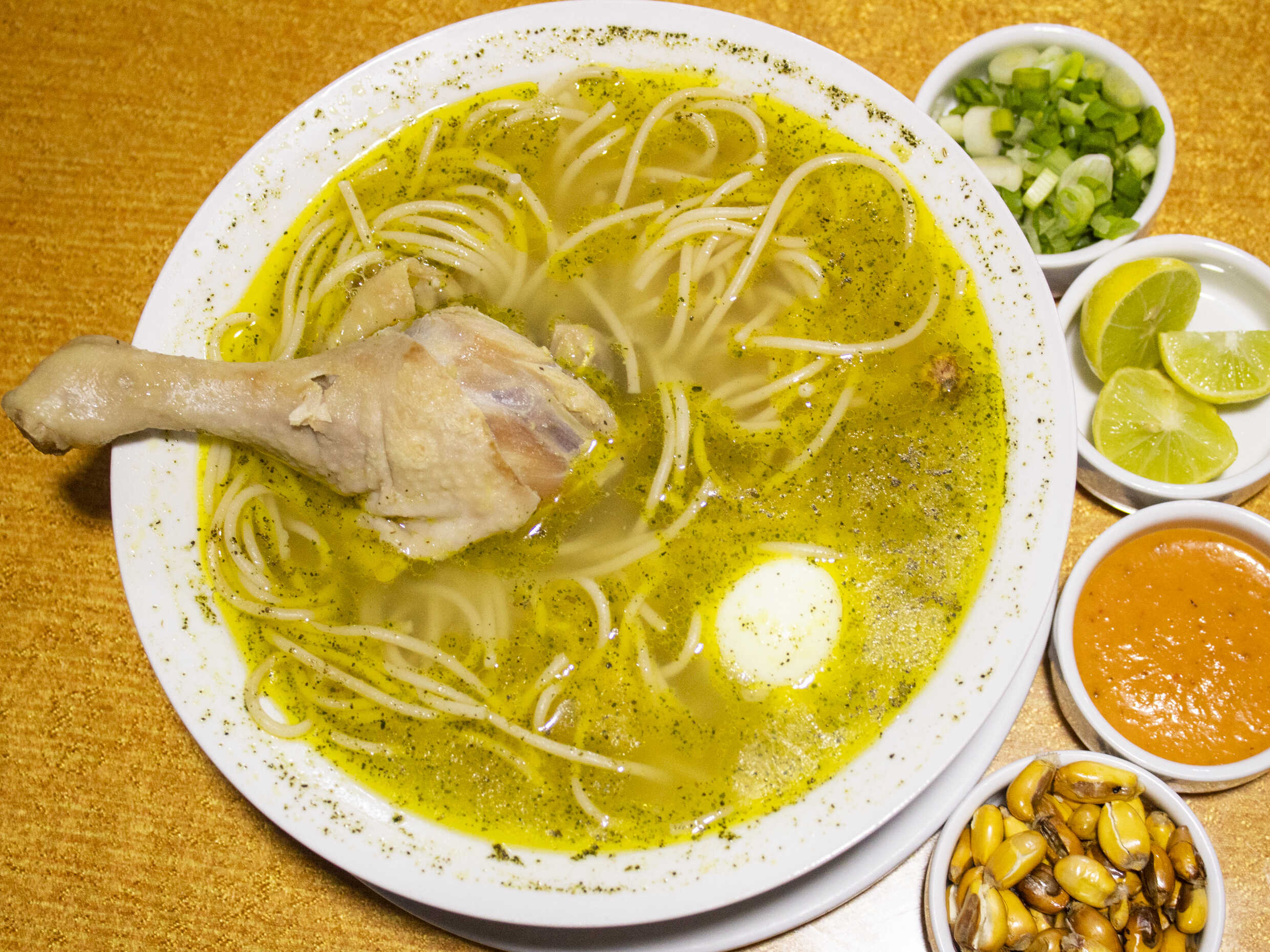 Caldo de Gallina con Presa