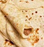 4 Taquitos de Frijol más vaso de agua de fruta