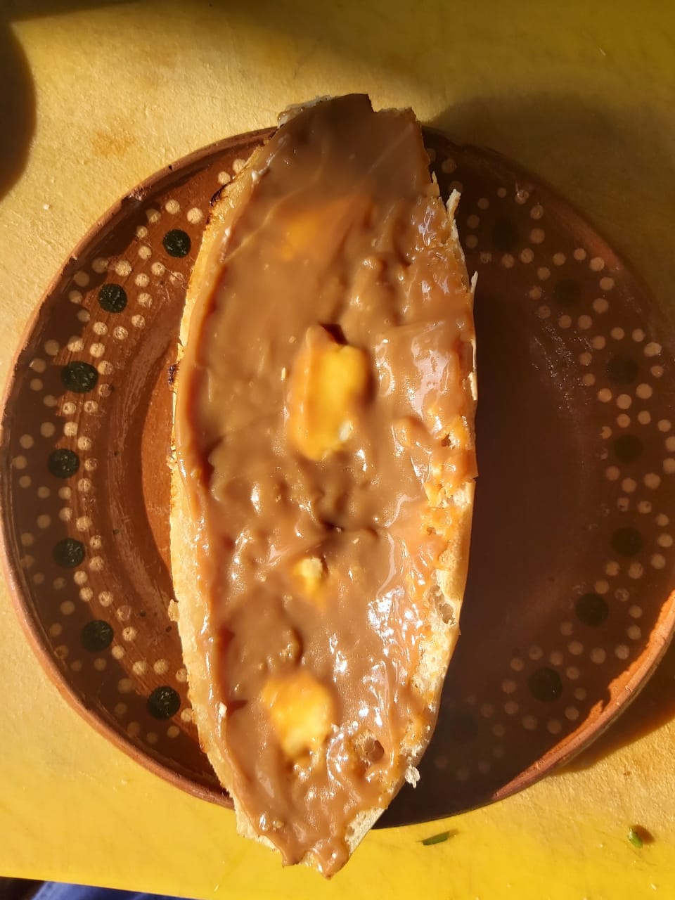 1 pieza pan,con mantequilla más tu ingrediente