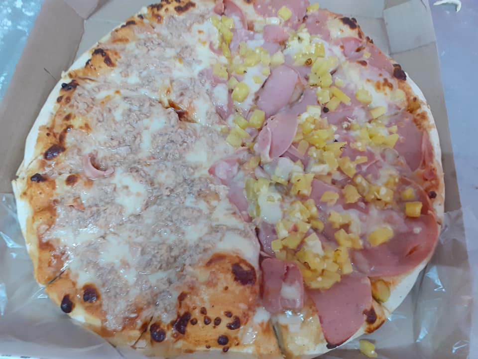 Pizza Mediana ( 2 ó más ingredientes)